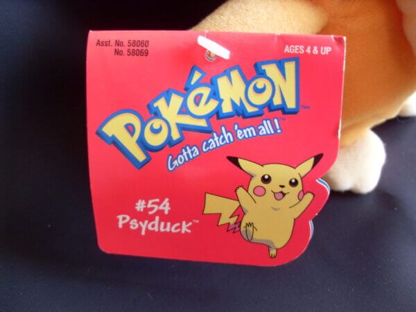 1999 Pokemon plush toy Psyduck, tag close-up.