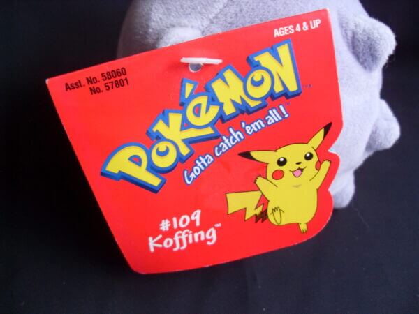 1999 Pokemon plush toy Koffing, tag close-up.