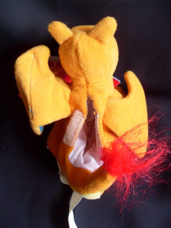 1999 Pokemon Treat Keepers Charizard plush toy, opened pouch.