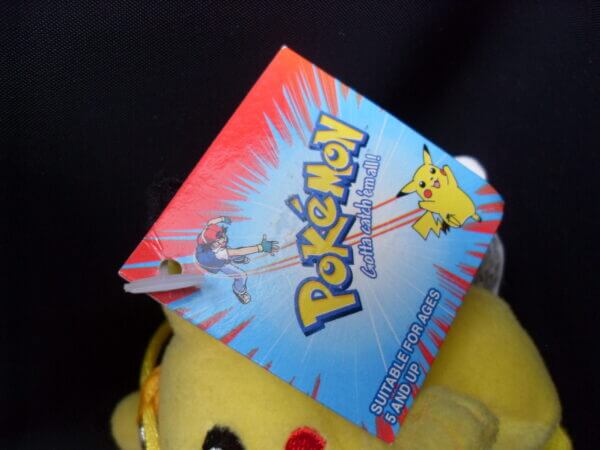 1999 Pokemon plush keychain Pikachu, tag close-up.