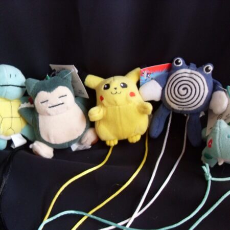 1999 plush Pokemon keychains of Squirtle, Snorlax, Pikachu, Poliwhirl, and Bulbasaur.