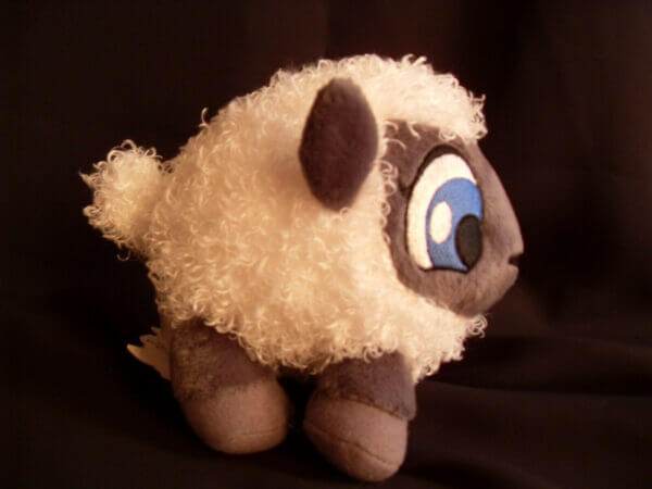 2002 Neopets White Babaa plush toy, side view.