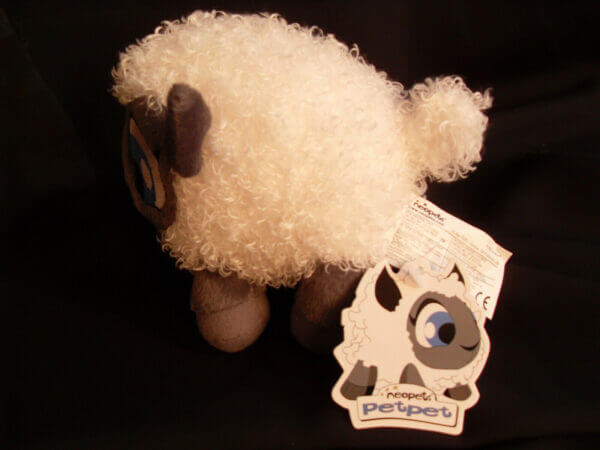 2002 Neopets White Babaa plush toy, tag close-up.