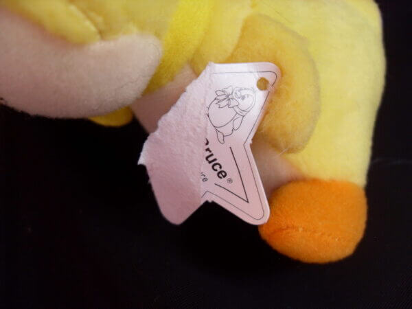 2005 Neopets McDonald's promo plush toy, Yellow Bruce damaged tag.