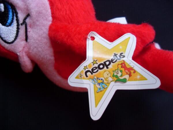 2005 Neopets McDonald's promo plush toy, Red Flotsam tag.