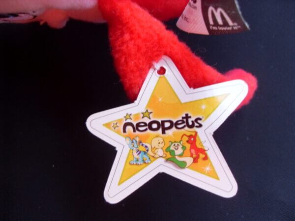 2005 Neopets McDonald's promo plush toy, Red Flotsam tag.