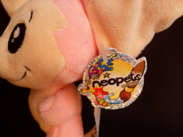 2004 Neopets Limited Too mini Pink Miamouse plush toy, tag close-up.