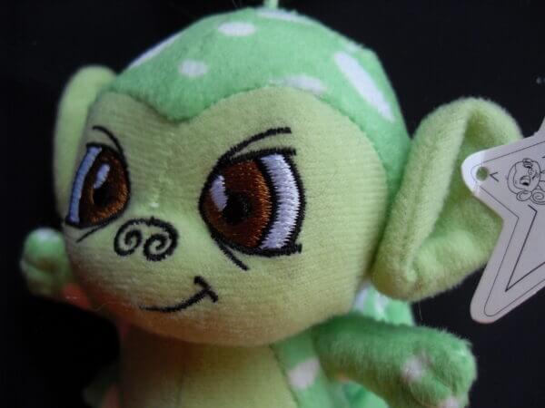 2005 Neopets McDonald's promo plush toy, Speckled Mynci face detail.