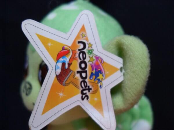 2005 Neopets McDonald's promo plush toy, Speckled Mynci tag.