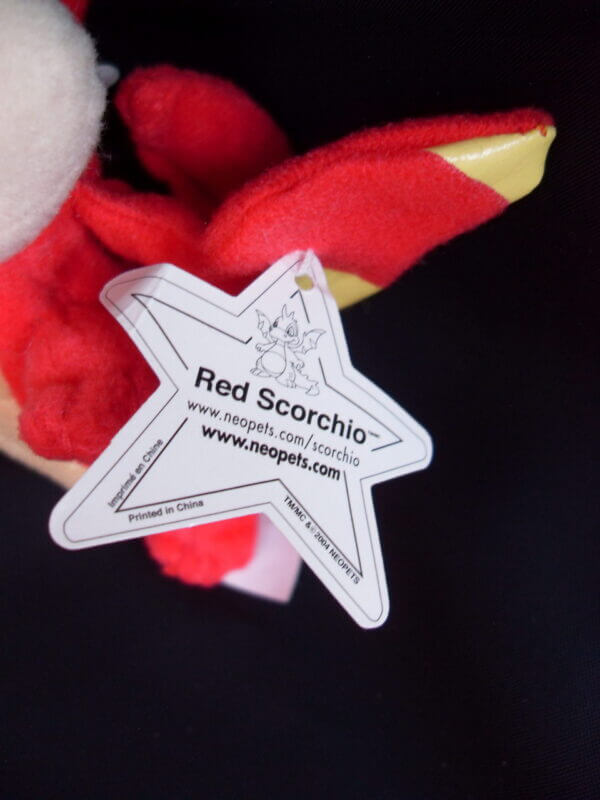 2005 Neopets McDonald's promo plush toy, Red Scorchio tag.