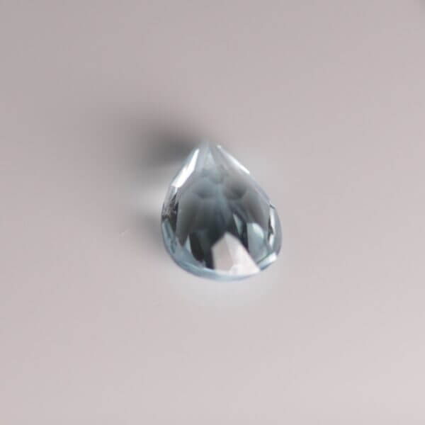 Aquamarine, 9x6mm pear, bottom view.