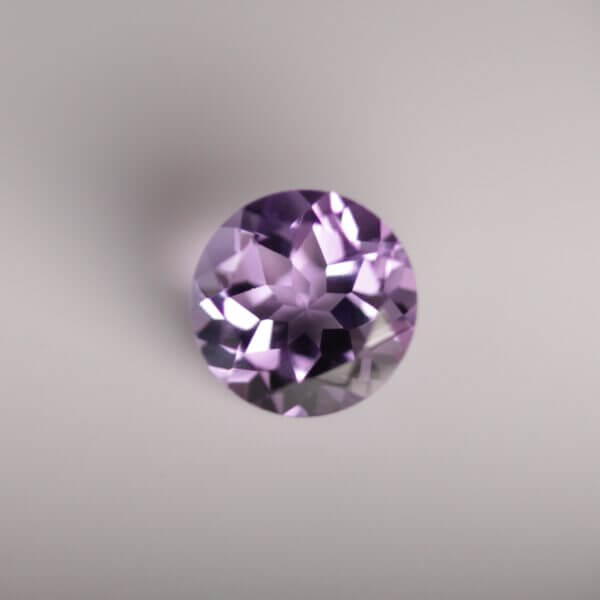Brazilian Amethyst, 8mm round cut, front view.