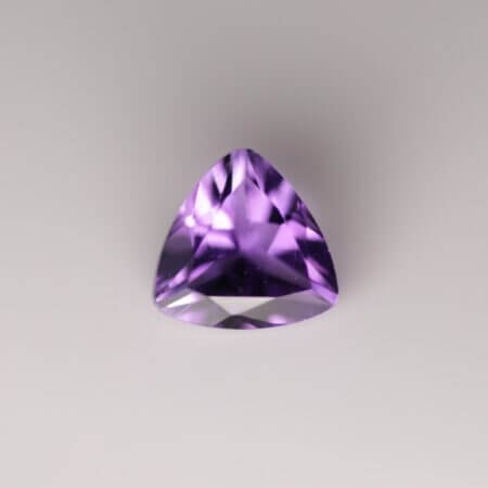 African Amethyst, 7mm trillion cut, front view.