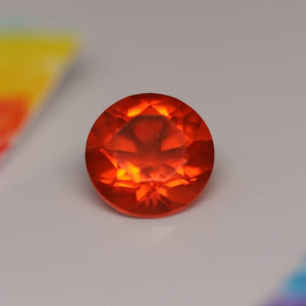 Mexican Fire Opal, 7mm round cut, detail view.