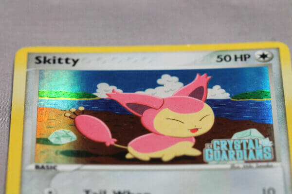 Skitty (41/100), the reverse holofoil Crystal Guardians card, detail shot (4/7).