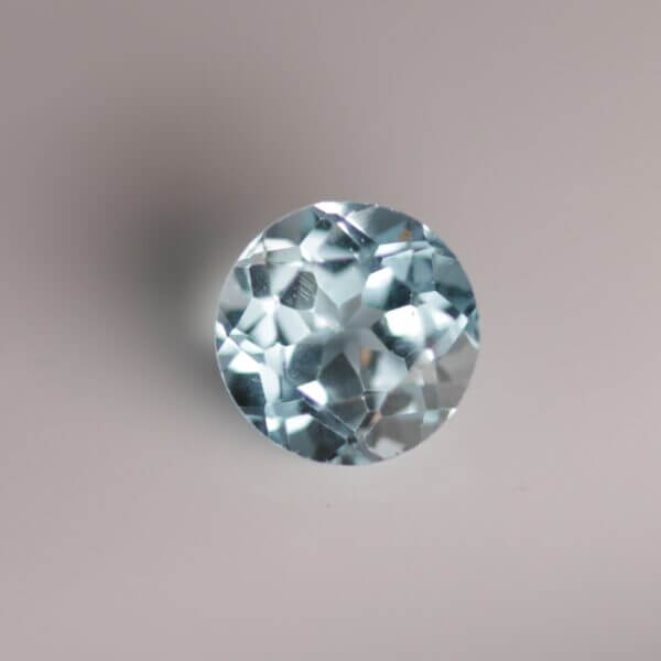 Sky Blue Topaz, 8mm modified round Portuguese cut, front view.