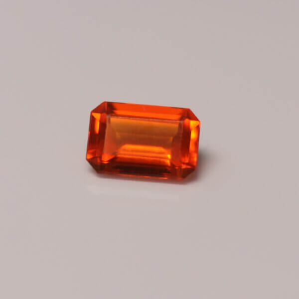 Mexican Fire Opal, 6x4mm octagon cut, front view.