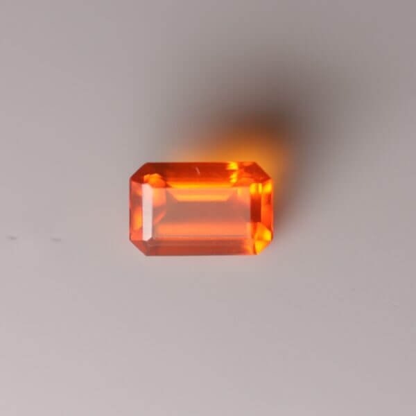 Mexican Fire Opal, 6x4mm octagon cut, front view.