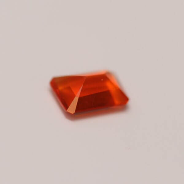 Mexican Fire Opal, 7x5mm octagon cut, side view.