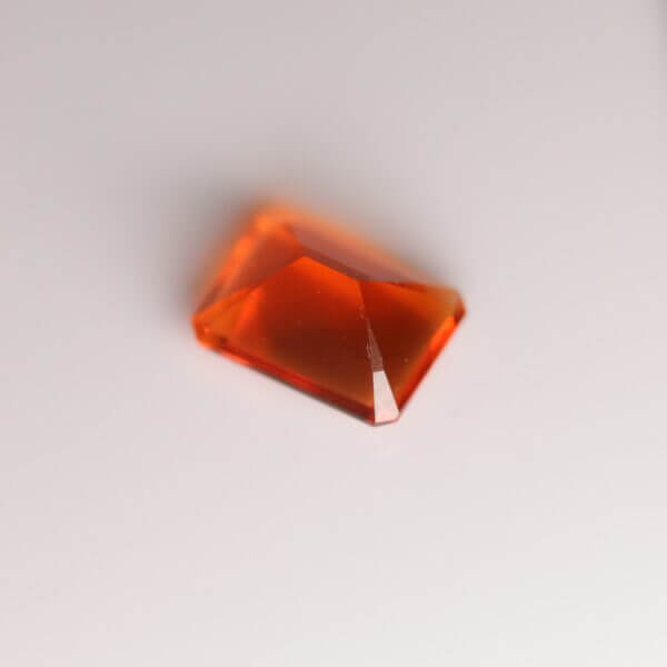 Mexican Fire Opal, 8x6mm octagon cut, side view.