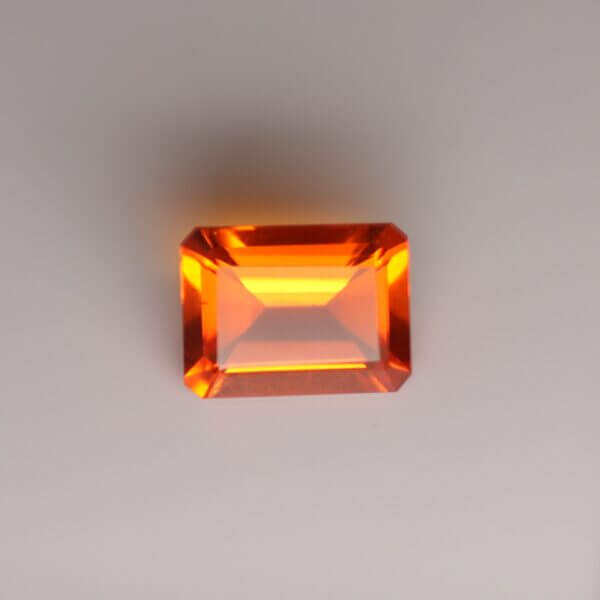 Mexican Fire Opal, 8x6mm octagon cut, front view.