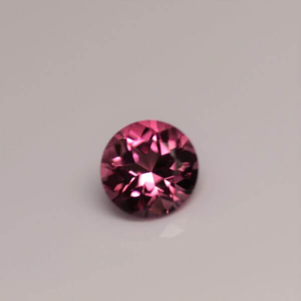Pink Tourmaline, 5.2mm round cut, front view.