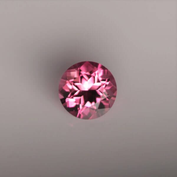 Pink Tourmaline, 5.2mm round cut, top view.