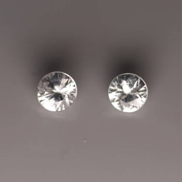 White Zircon, matched pair 4.5mm round cut, front view.