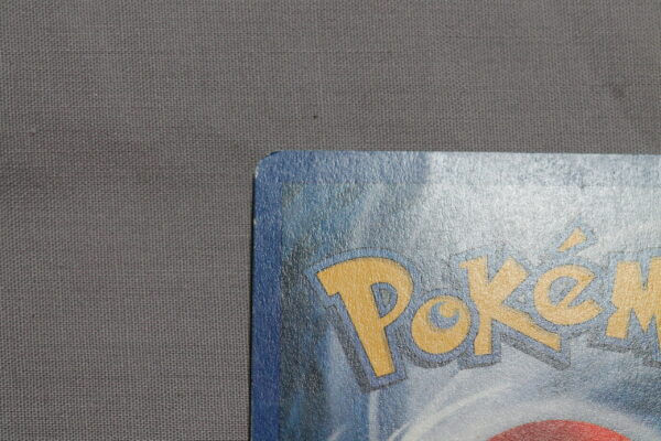 Scyther (26/64) and Vaporeon (28/64) duo, damaged rares from the Jungle set, detail shot (9/9).