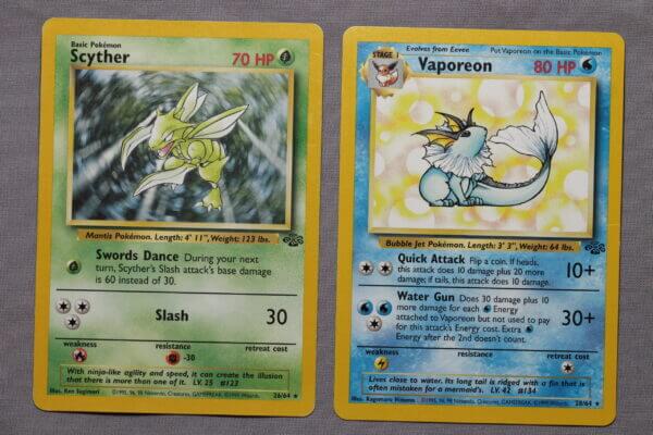 Scyther (26/64) and Vaporeon (28/64) duo, damaged rares from the Jungle set, front view.