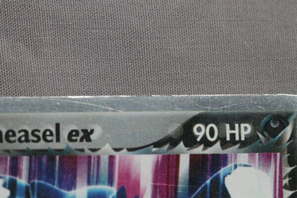 Rocket's Sneasel ex (103/109) from EX Team Rocket Returns, detail shot (5/8).