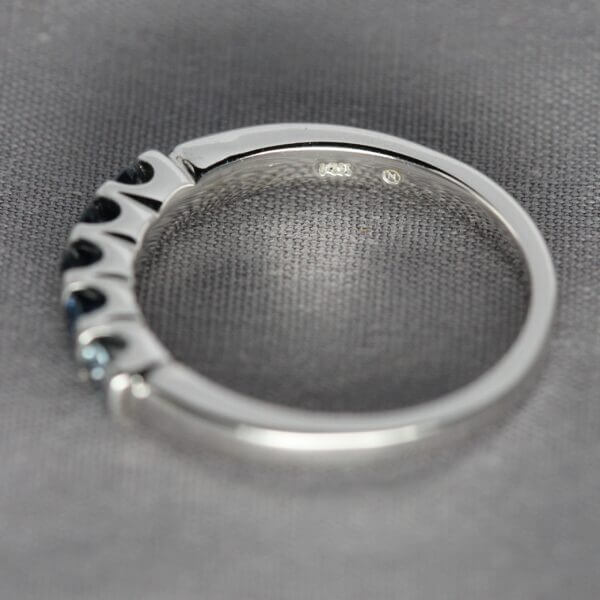 14kt White Gold and Blue Montana Sapphire stacking ring, mark view.