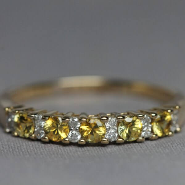 14kt Yellow Gold, Diamond, and 5 stone Yellow Montana Sapphire ring, stone view.