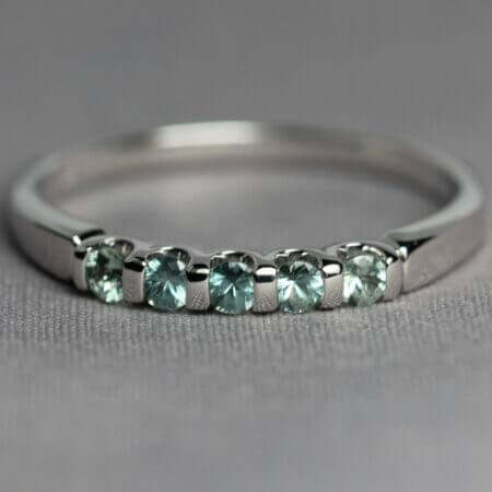 14kt White Gold and Green Montana Sapphire stacking ring, front view.