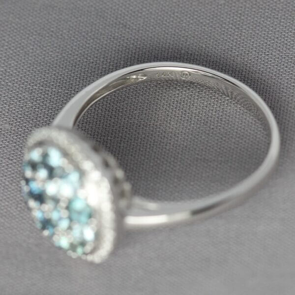 14kt White Gold, Diamond, and Blue Montana Sapphire scatter ring, mark view.