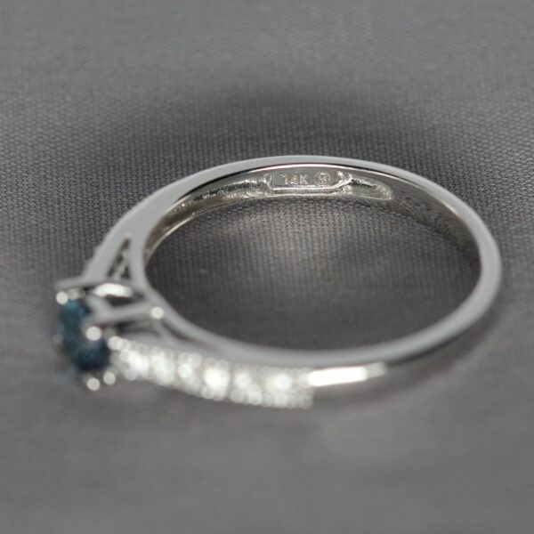 14kt White Gold, Diamond, and Blue Montana Sapphire solitaire ring, mark view.