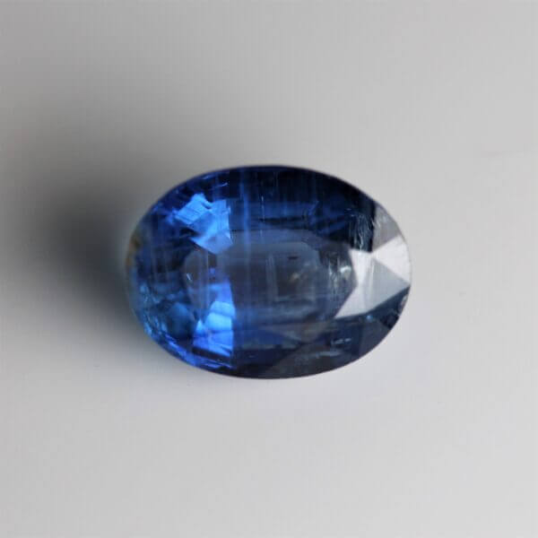 Kyanite, 9x7mm oval cut, front view.