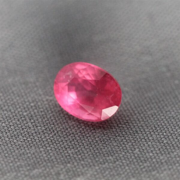 Mahenge Spinel, 7x5mm oval cut, side view.