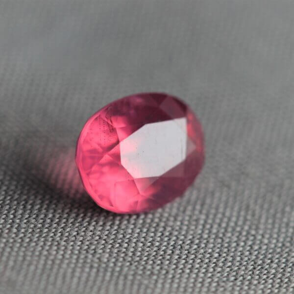 Mahenge Spinel, 8x6mm oval cut, side view.