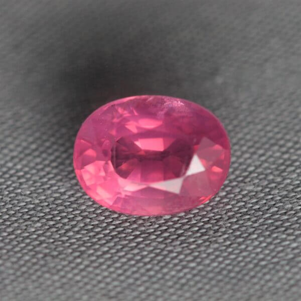 Mahenge Spinel, 8x6mm oval cut, front view.