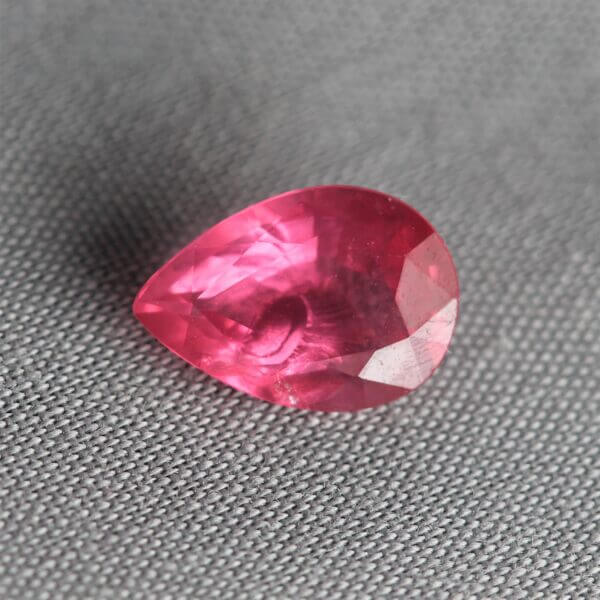 Mahenge Spinel, 9.5x6.5mm pear cut, front view.
