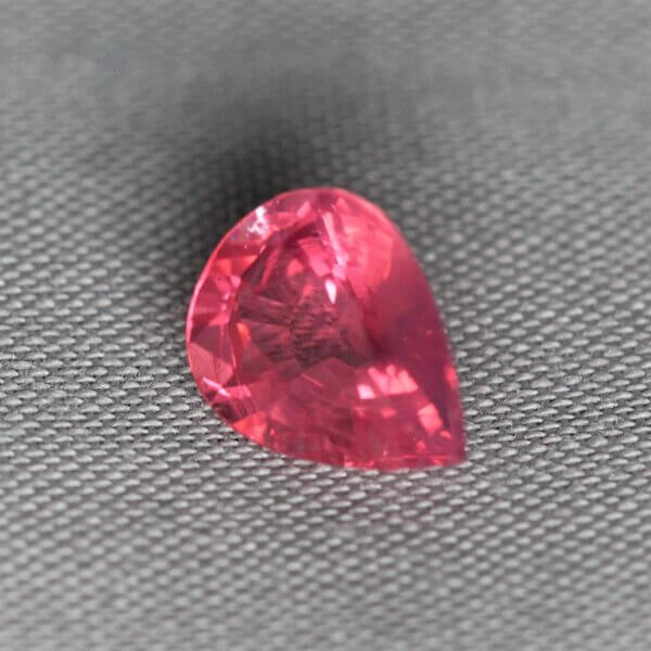 Mahenge Spinel, 7.5x6mm pear cut, side view.
