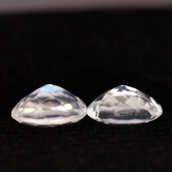 Moonstone, 7x5mm faceted oval cut matched pair, side view.