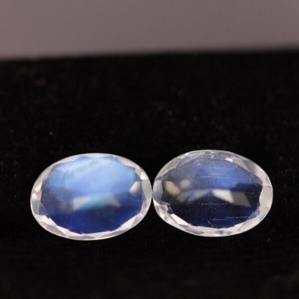 Moonstone, 7x5mm faceted oval cut matched pair, back view.