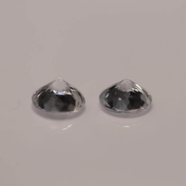 White Sapphire, 4.5mm round cut matched pair, side view.