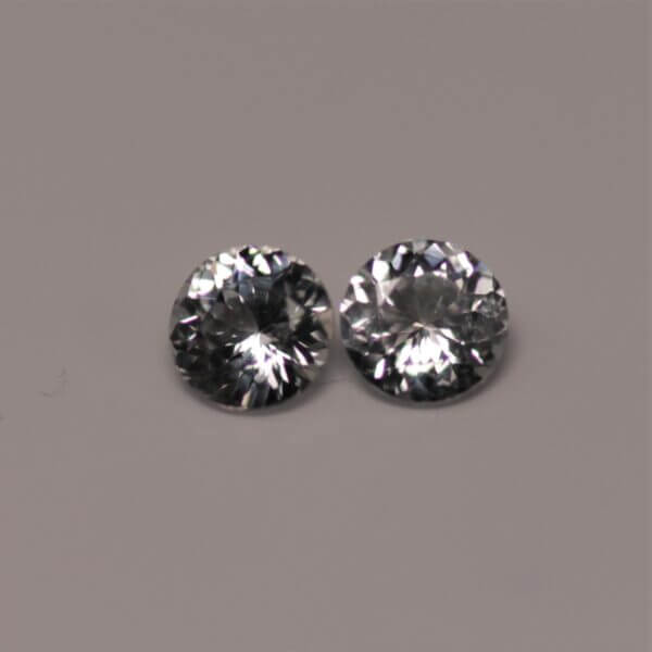 White Sapphire, 4.5mm round cut matched pair, front view.