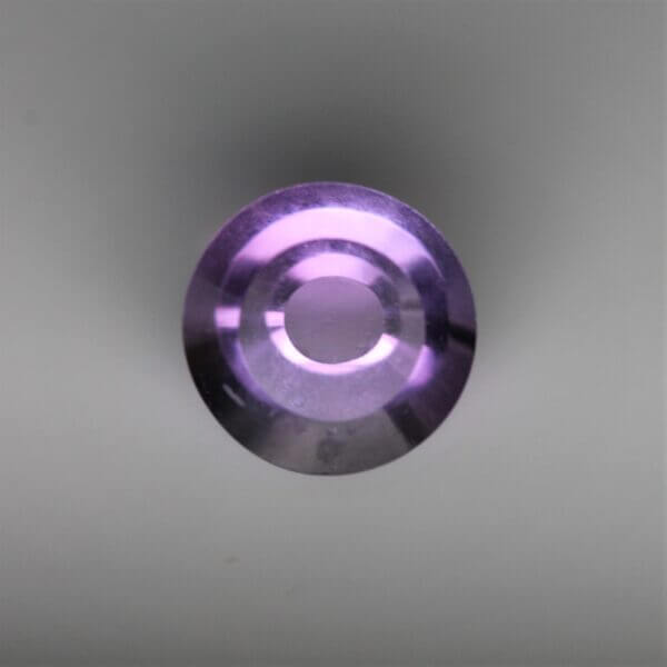 Brazilian Amethyst, 8mm concentric round cut, front view.