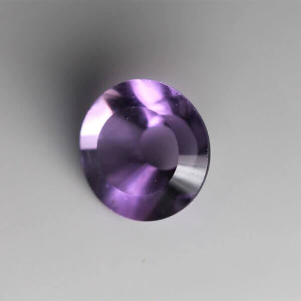 Brazilian Amethyst, 8mm concentric round cut, side view.