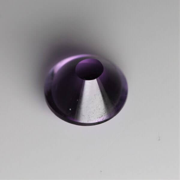Brazilian Amethyst, 8mm concentric round cut, back view.