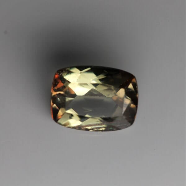 Andalusite, 8x6mm cushion cut, front view.